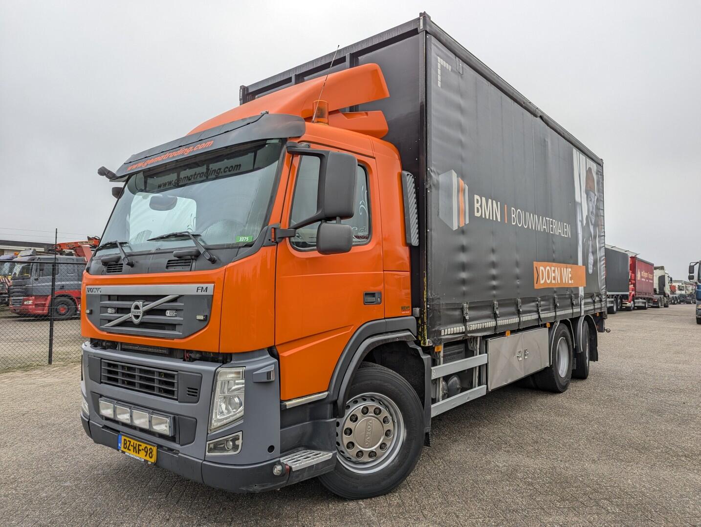Volvo FM330 6x2/4 Daycab Euro5 EEV - SchuifzeilenBak 6.7m. - KooiAap Aansluiting - HH Vloer - Rongen | Vrachtwagens | Schuifzeil